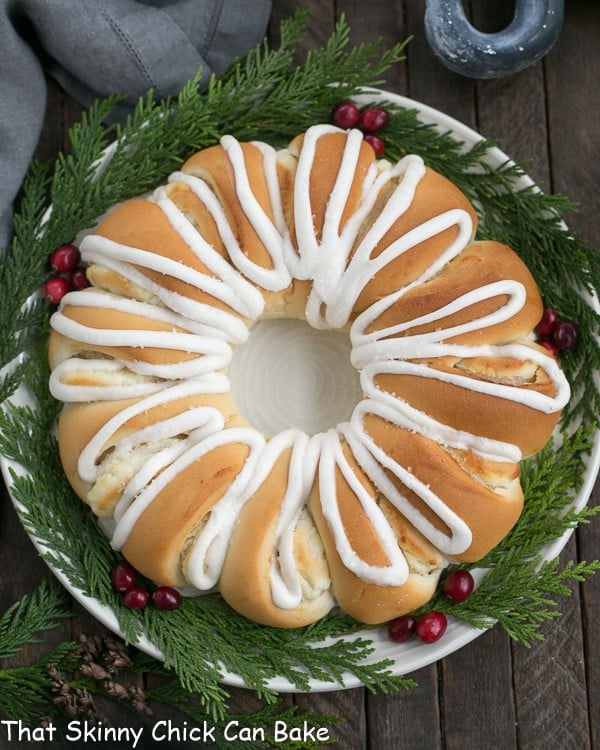 Cream Cheese Tea Roll - An easy, semi-homemade brunch treat that's certain to be a hit! Overhead view of Cream Cheese Tea Roll on a white plate.