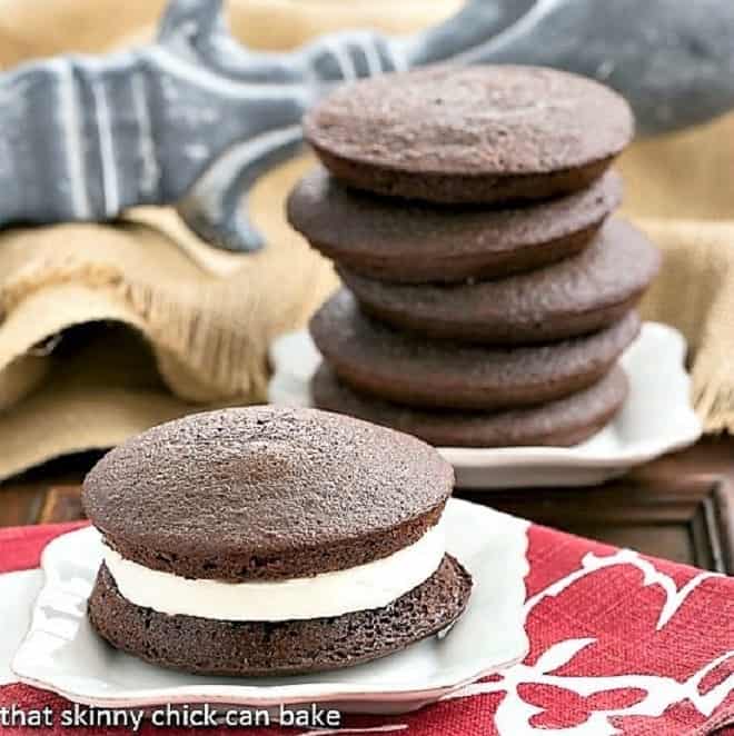 Classic Whoopie Pies on white dessert plates.