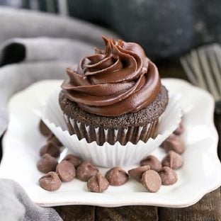 Ghirardelli Dark Chocolate Cupcakes on a square white plate with chocolate chips