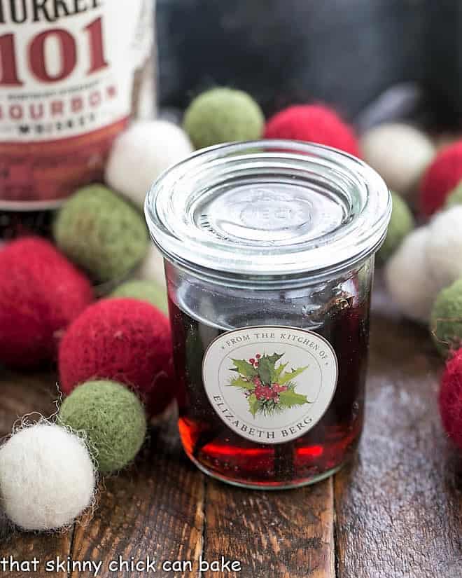 Homemade Vanilla Extract in a decorative jar for gifting.