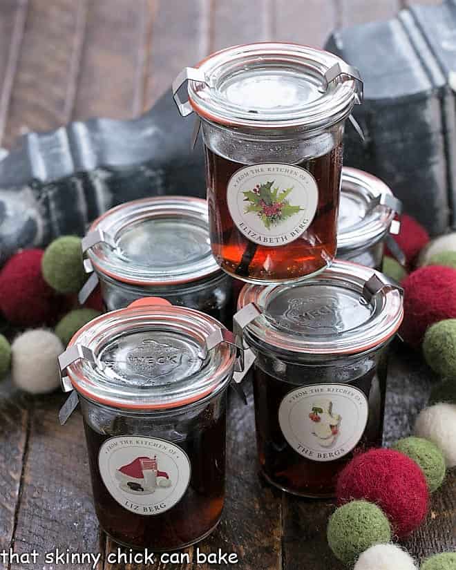 5 jars of homemade vanilla extract ready for gift giving.