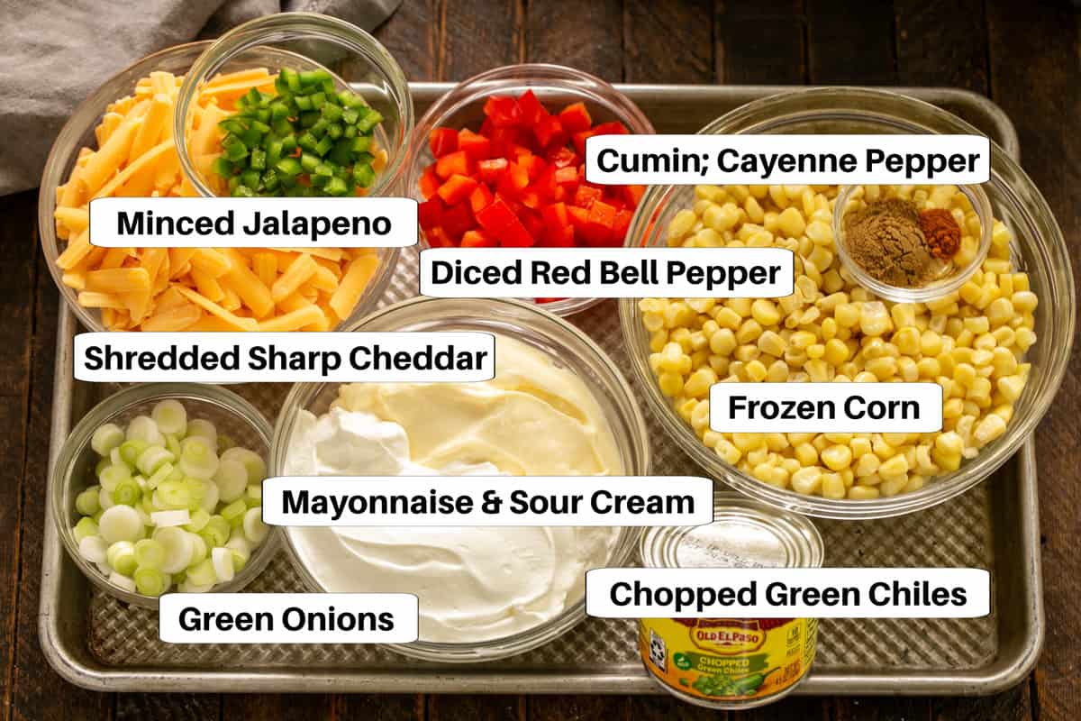 Sour Cream Corn Dip Ingredients on a sheetpan with labels.