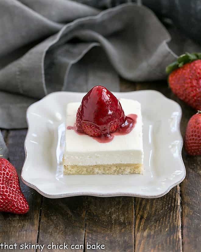 Slice of Strawberry Pie Dessert on a square white dessert plate