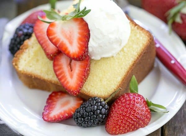 The Best Pound Cake | Dense, yet tender and delicious! Perfect topped with berries and cream!