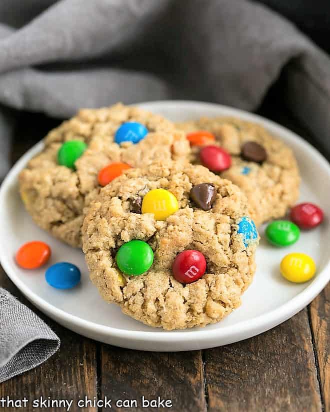 Classic Monster Cookies on a white dessert plate.