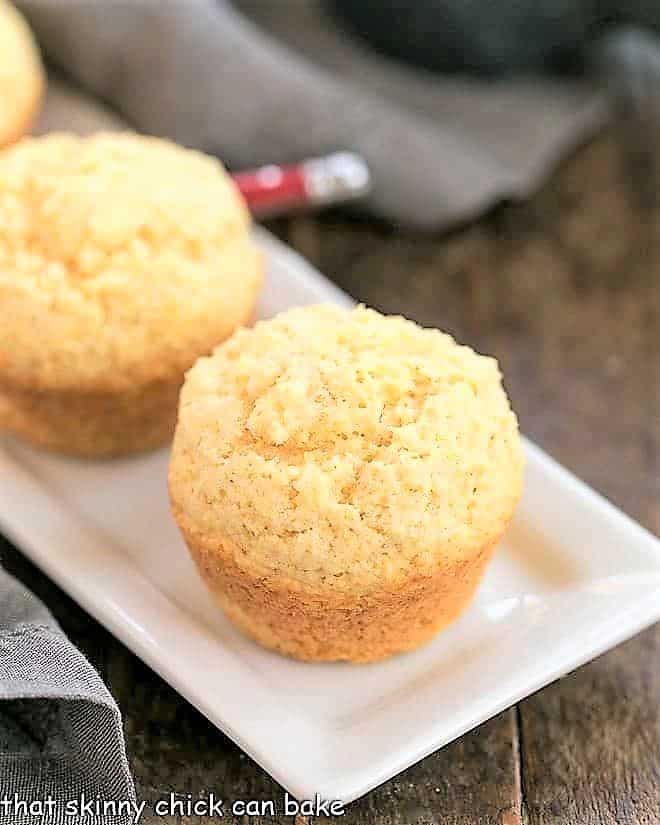 Buttermilk Corn Muffins on a rectangular, white tray.