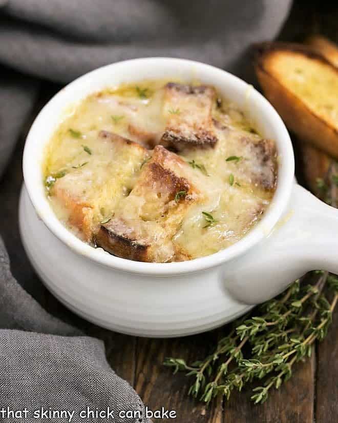 Classic French Onion Soup in a white ceramic soup bowl