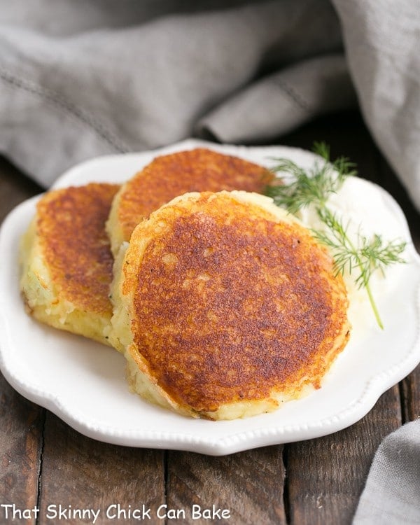 Gruyere Potato Cakes on a decorative white plate