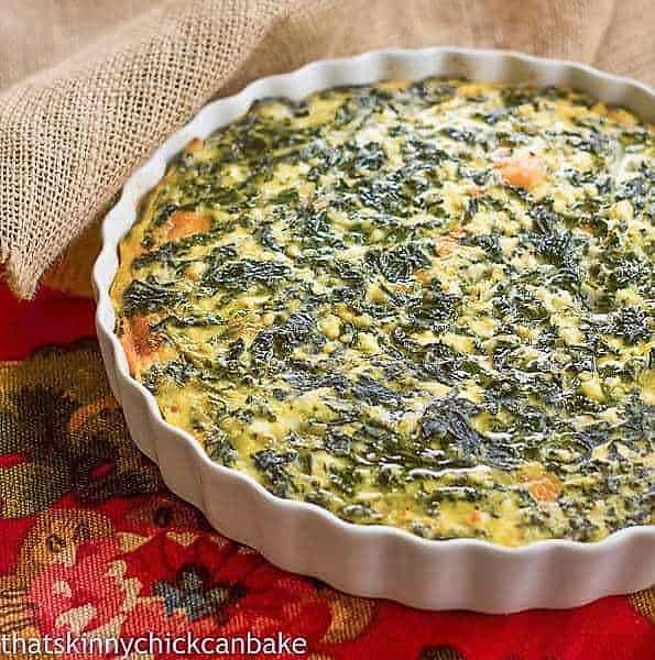 Spinach Souffle in a white casserole dish.