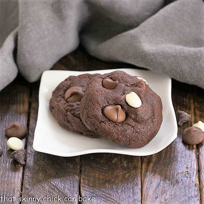 Quadruple Chocolate Cookies on a small, wavy, white plate