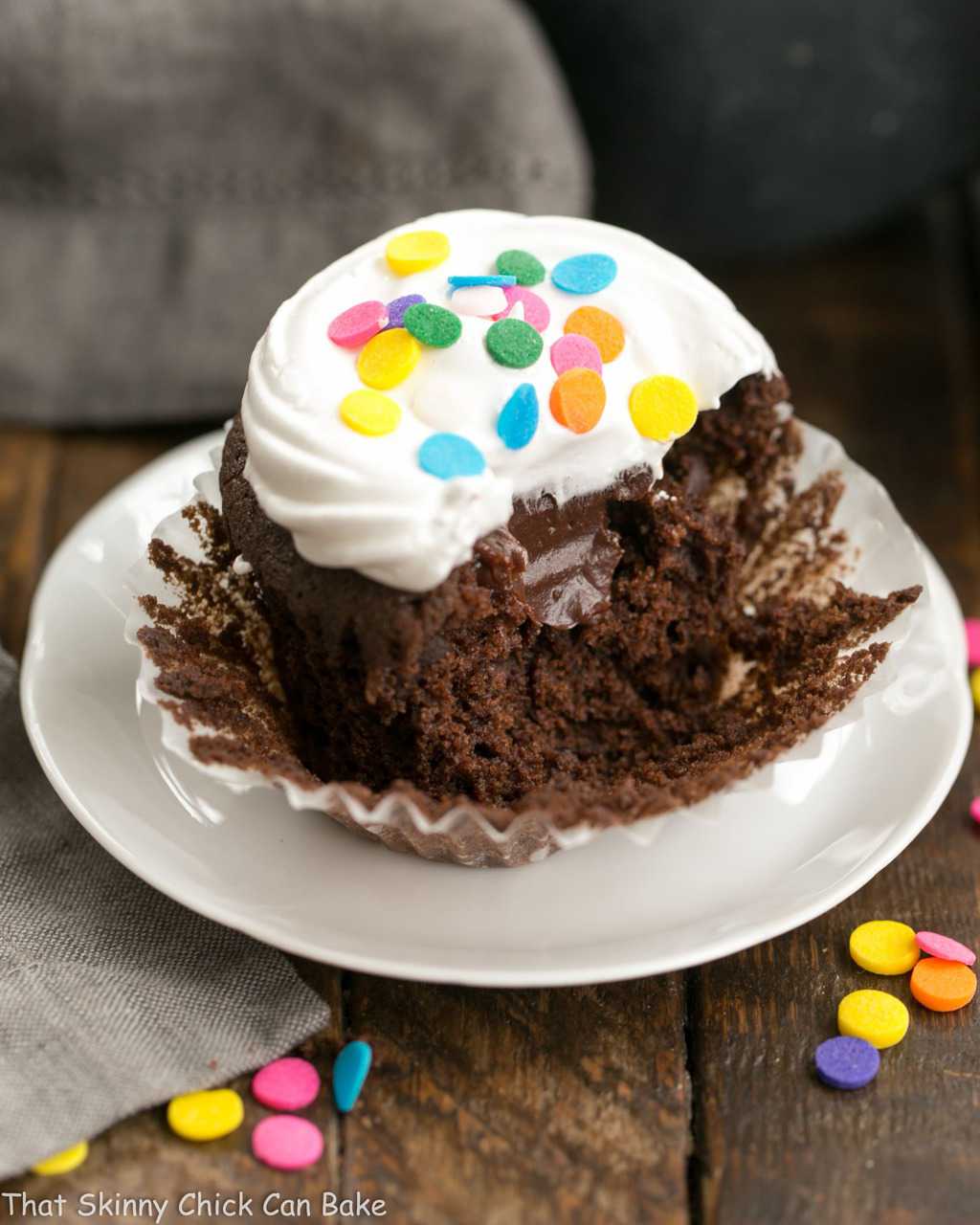 Inside view of Cocoa Cupcakes with Ganache Filling on a white plate.