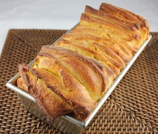 Orange Pull apart bread in a loaf pan