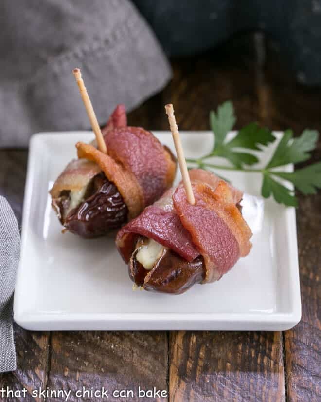 Bacon Wrapped Dates on white plate