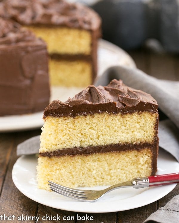 Perfect Yellow Cake Recipe with Chocolate Buttercream | An exquisite, tender yellow cake topped with dreamy chocolate frosting!