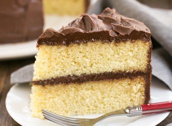 Perfect Yellow Cake Recipe with Chocolate Buttercream | An exquisite, tender yellow cake topped with dreamy chocolate frosting!