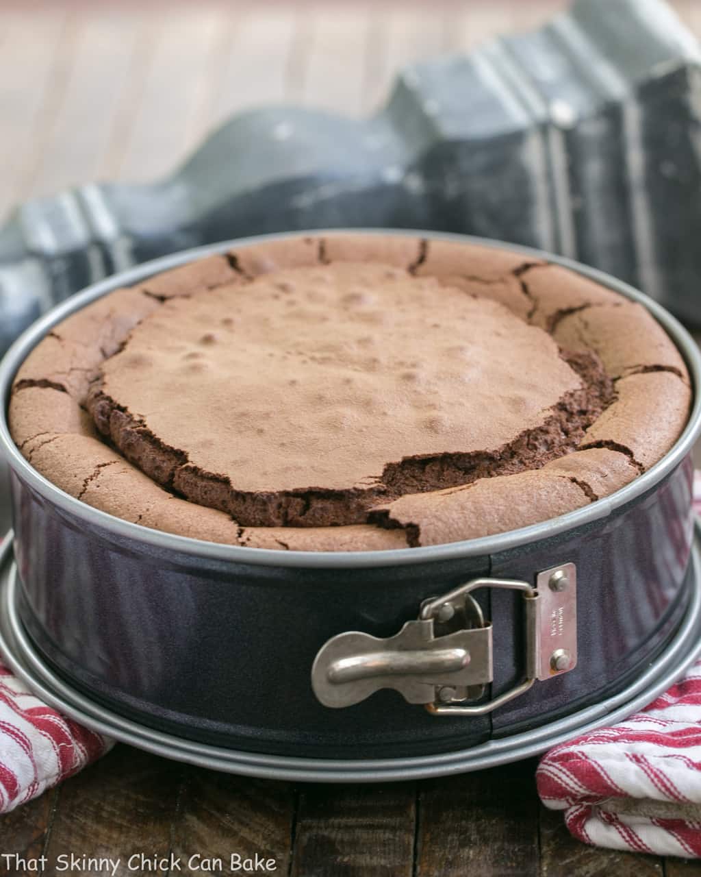 Flourless Chocolate Cake with Ganache Topping in a springform pan before releasing.
