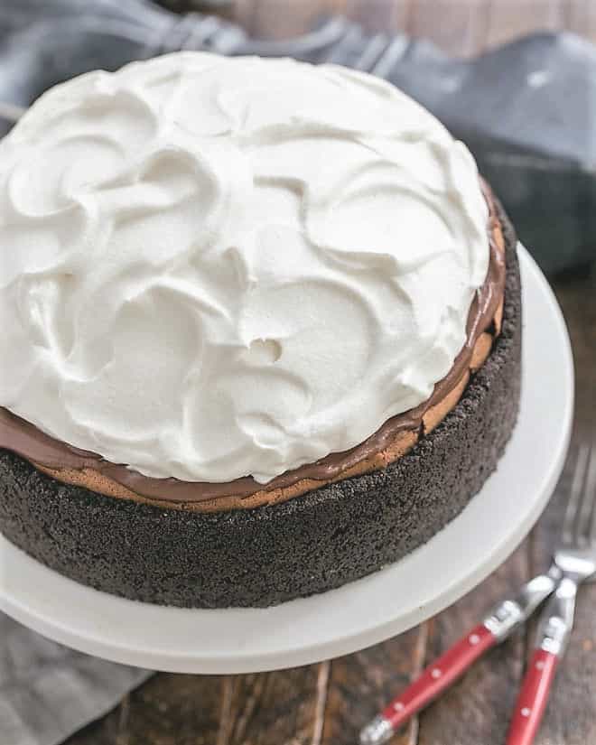 Overhead view of Oreo Mud Pie on a white cake stand.