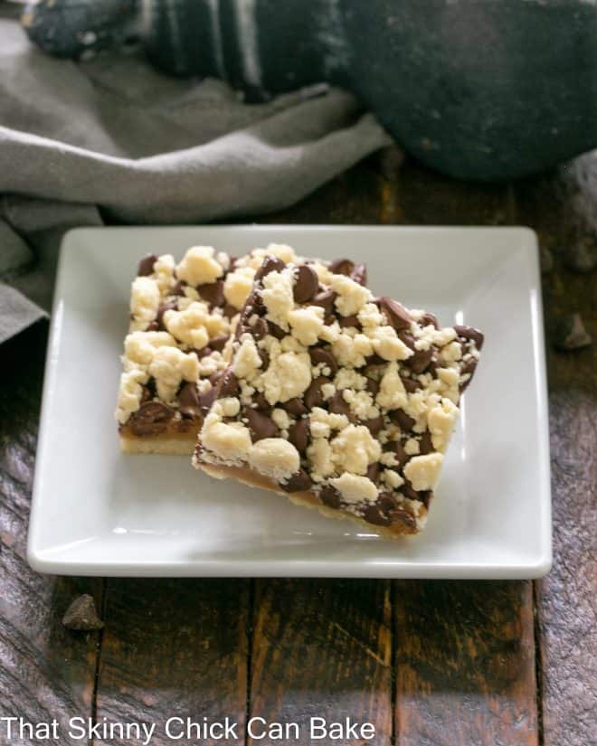 2 Caramel Bars with Streusel on a square white plate