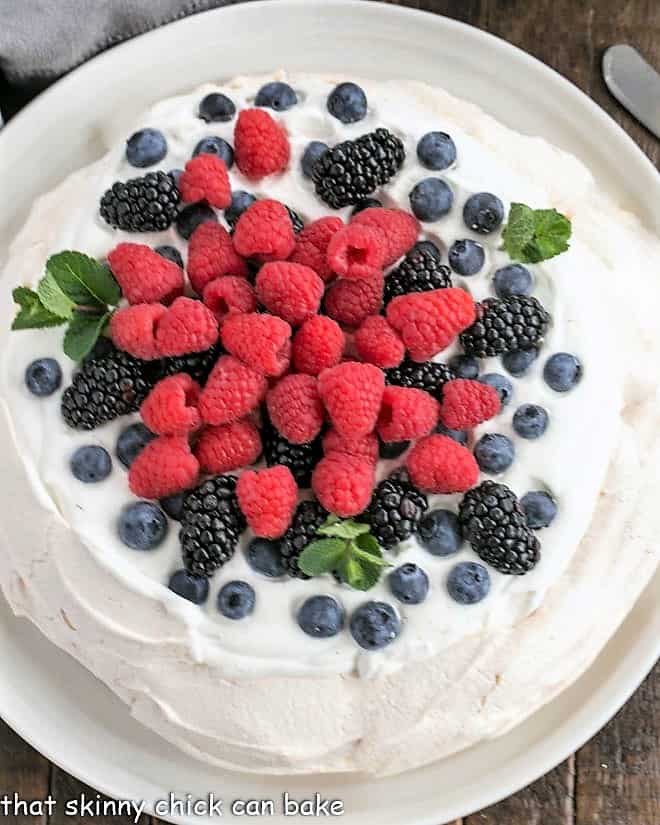 Overhead view of lemon pavlova on a white plate