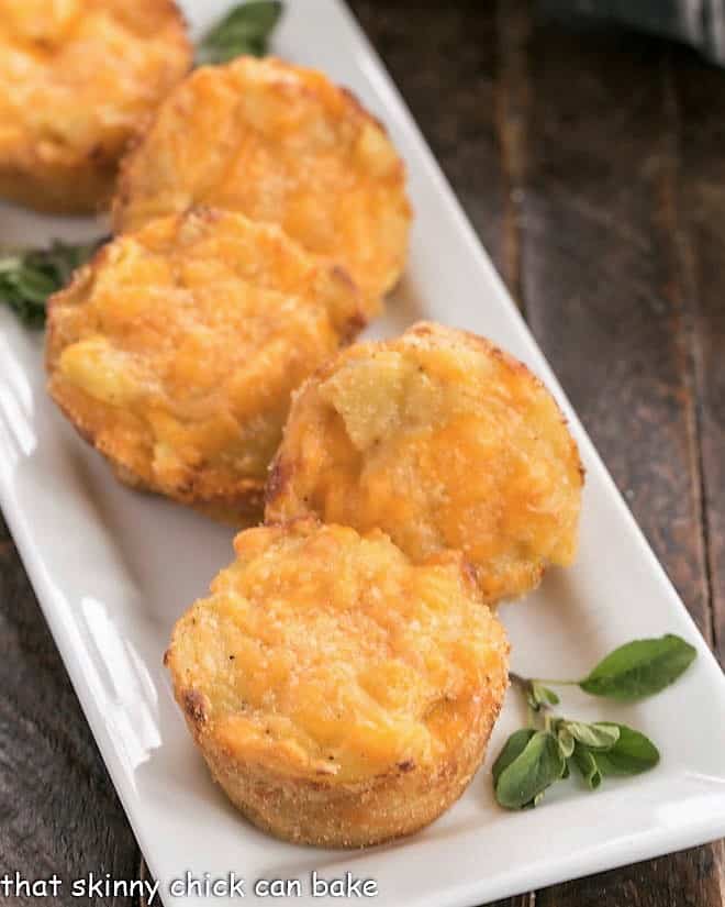 Cheesy Potato Cups on a white serving tray