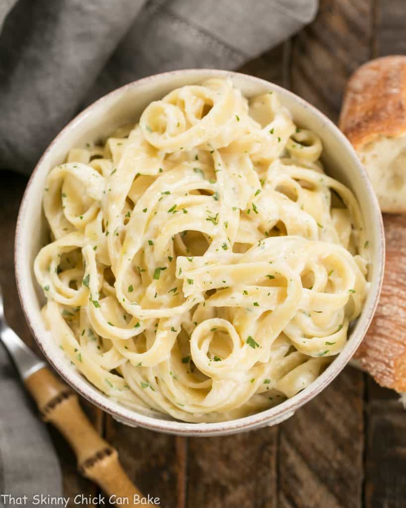 Overhead view of a bowl Light Fettuccine Alfredo.