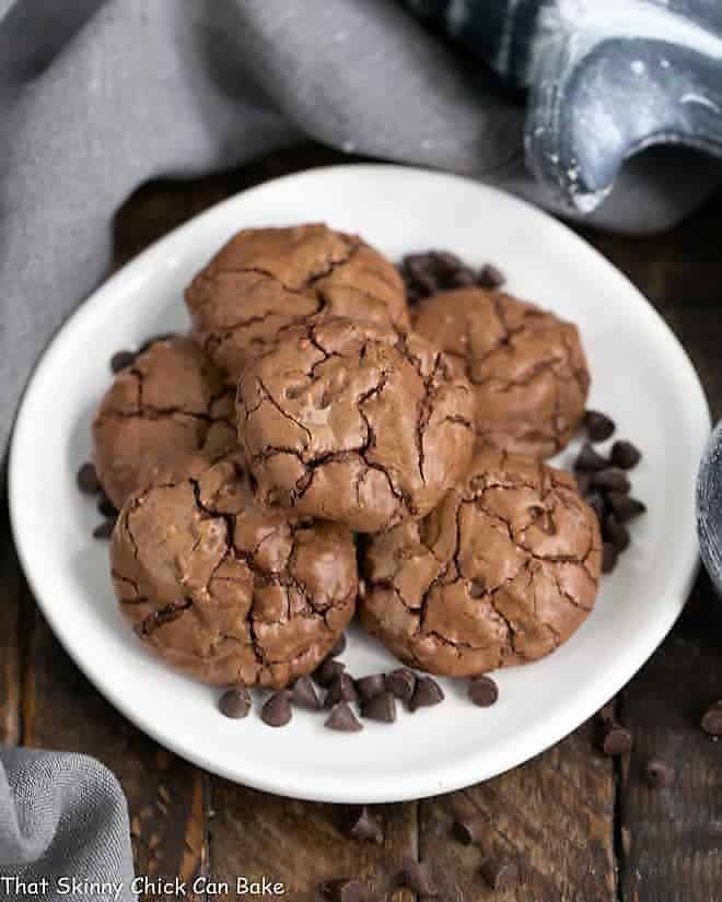 Chocolate Brownie Cookies with Mini Chocolate Chips on a white plate garnished with mini chocolate chips