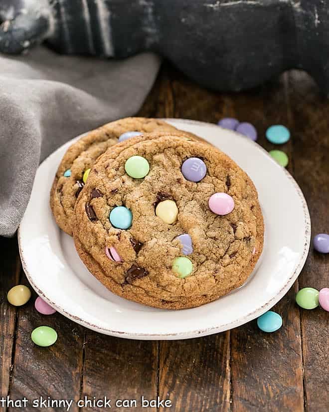 2 Brown Butter Easter Cookies with pastel M & M's on a round white plate