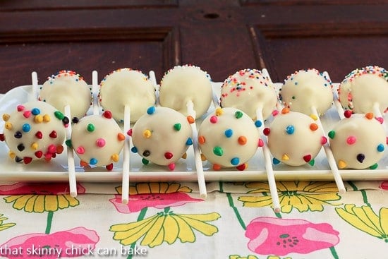 Cheesecake Pops lined up on a white tray