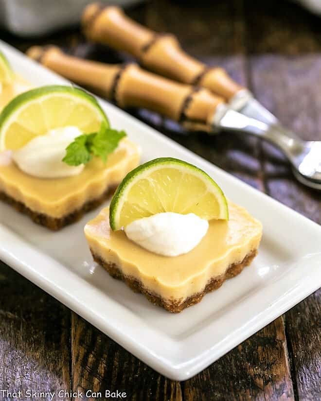 Key LIme Tartlets on a white tray.