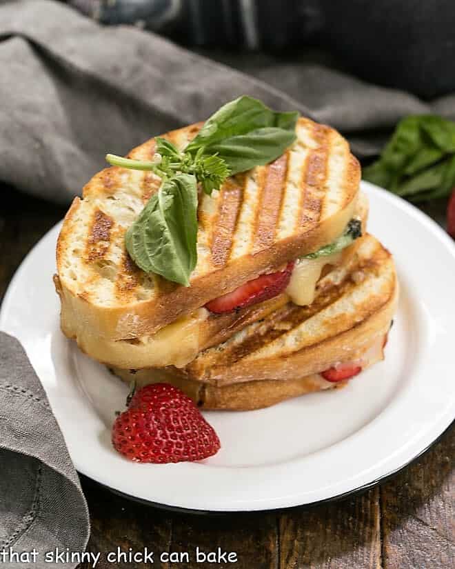 Strawberry, Turkey and Brie Grilled Cheese on a white lunch plate