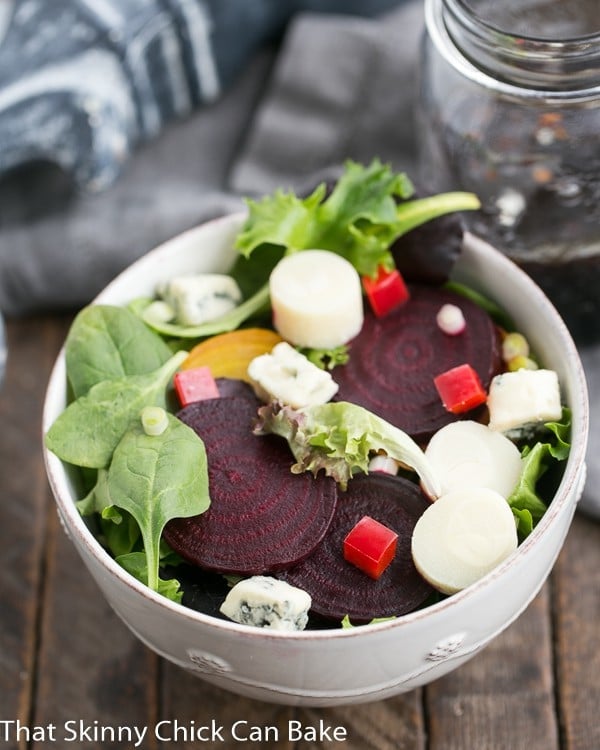 Beet Salad with Blue Cheese and Hearts of Palm in a white ceramic bowl.