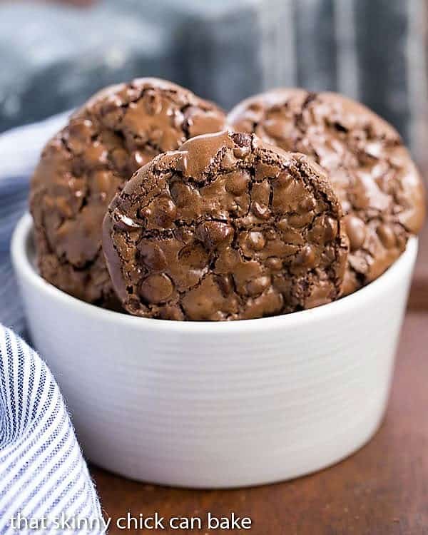 Flourless Chocolate Cookies in a white ceramic bowl.