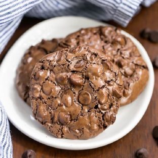 3 Flourless Chocolate Cookies on a small white plate