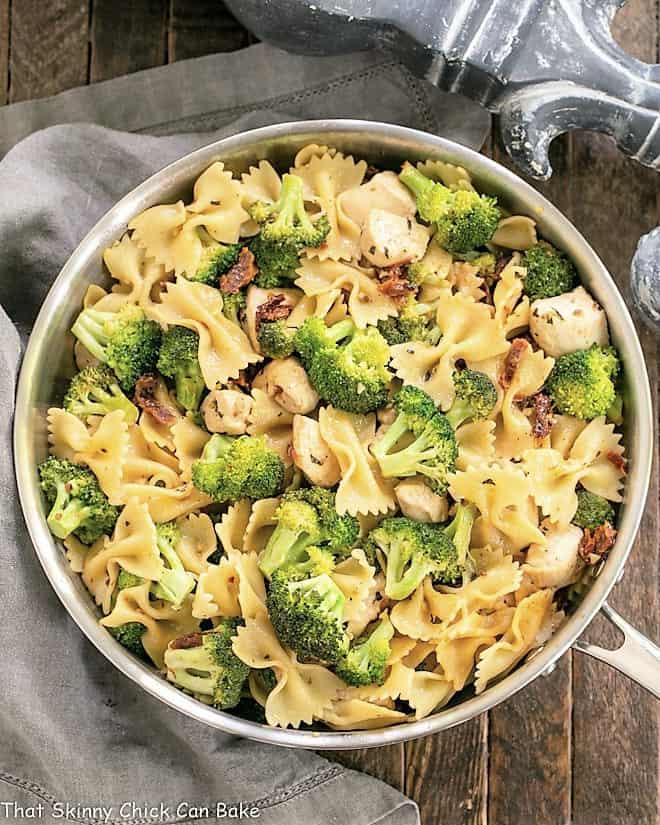 Overhead view of Chicken with Broccoli and Pasta in a saute pan
