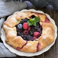 Overhead view of Mixed Berry Galette on a white serving plate