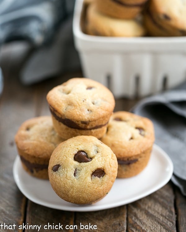 Chocolate Chip Lava Cookies on a white plate with a bowl in the background