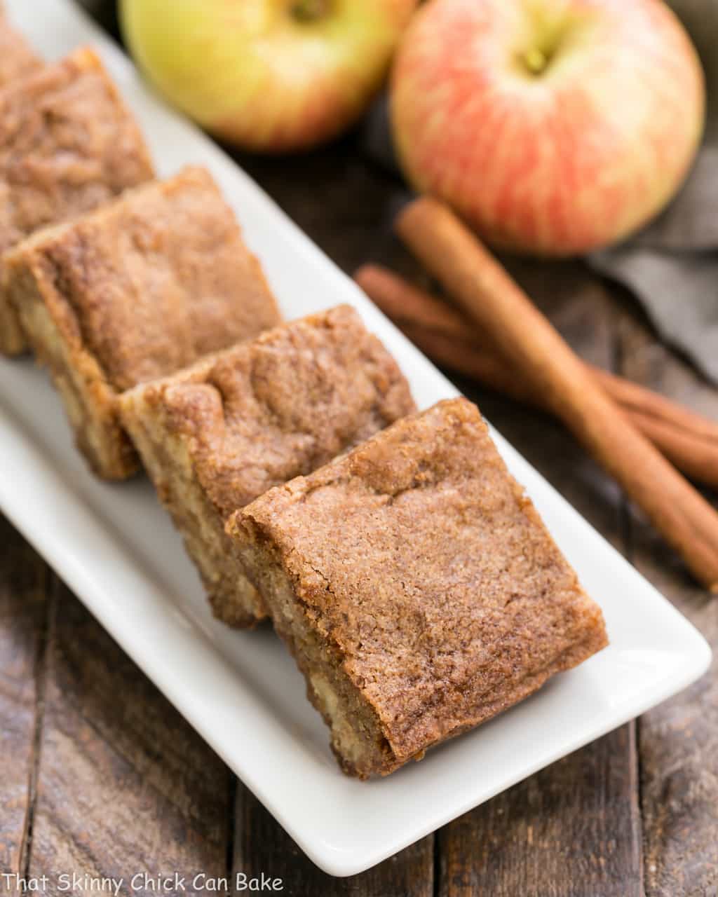 Apple Brownies squares on a white ceramic platter.
