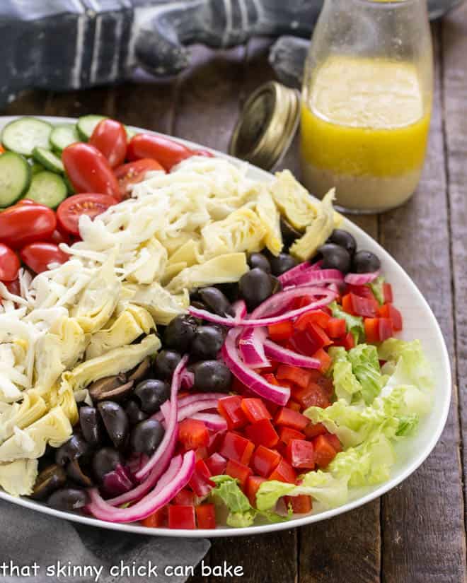 Kitchen Sink Chopped Salad on a white ceramic platter.