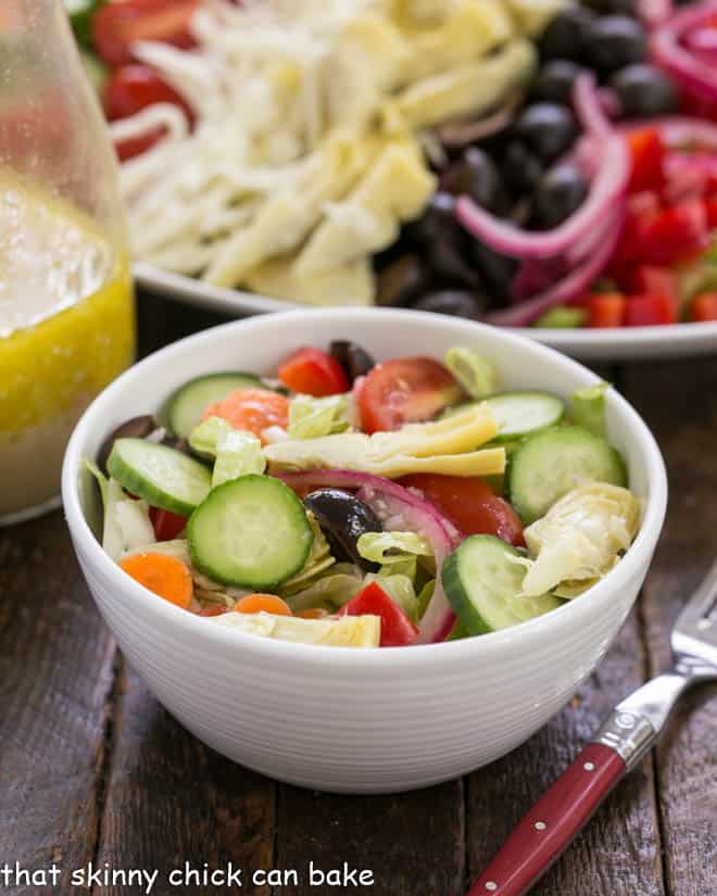 Small white bowl full of kitchen sink chopped salad