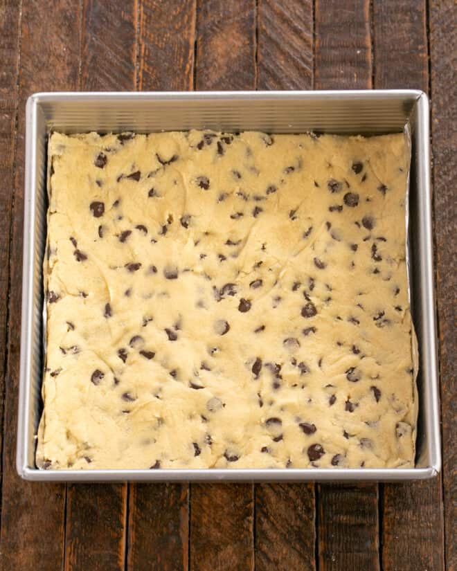 Spread cookie dough in bottom of prepared pan.