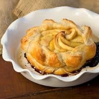 Apple Baked Brie in a white baking dish