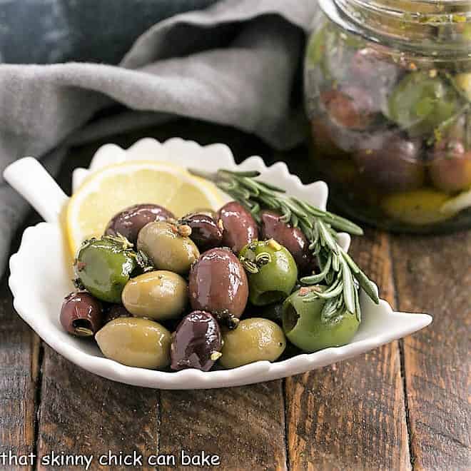 French Herbed olives in a leaf dish