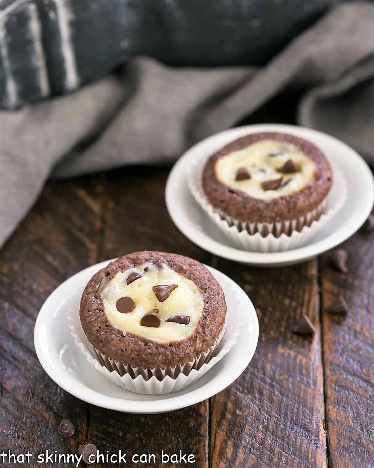 2 Brownie Bites in small round dishes.