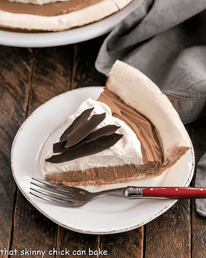 Slice of Chocolate Angel Pie on a white plate