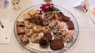 A glass plate of mini desserts