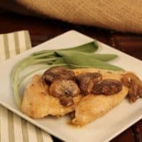 Creamy Chicken Marsalad on a square white plate