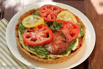 Fresh tomato tart on a white plate