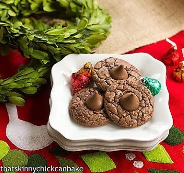 Double Chocolate Thumbprints on a stack of square white plates.