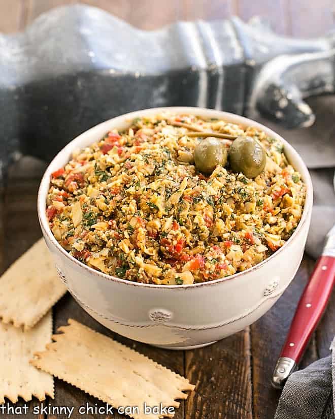 Roasted Red Pepper Artichoke Tapenade in a white serving bowl