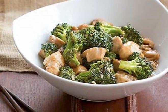Chicken and Broccoli Stir Fry in a white ceramic bowl